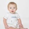 Roco Baby Boys White & Silver Romper 1 Roco Baby Boys White & Silver Romper -Stylish Children's Clothing Store roco rowe white silver 1 55528.1619021556